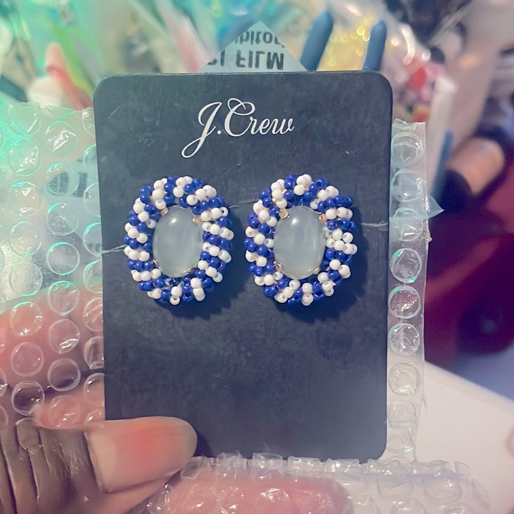 Blue and white stripe oval  ,pierced earrings that can go with any outfit .